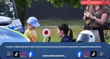 Policjanci z Węgierskiej Górki edukują dzieci podczas pikniku z okazji Dnia Dziecka